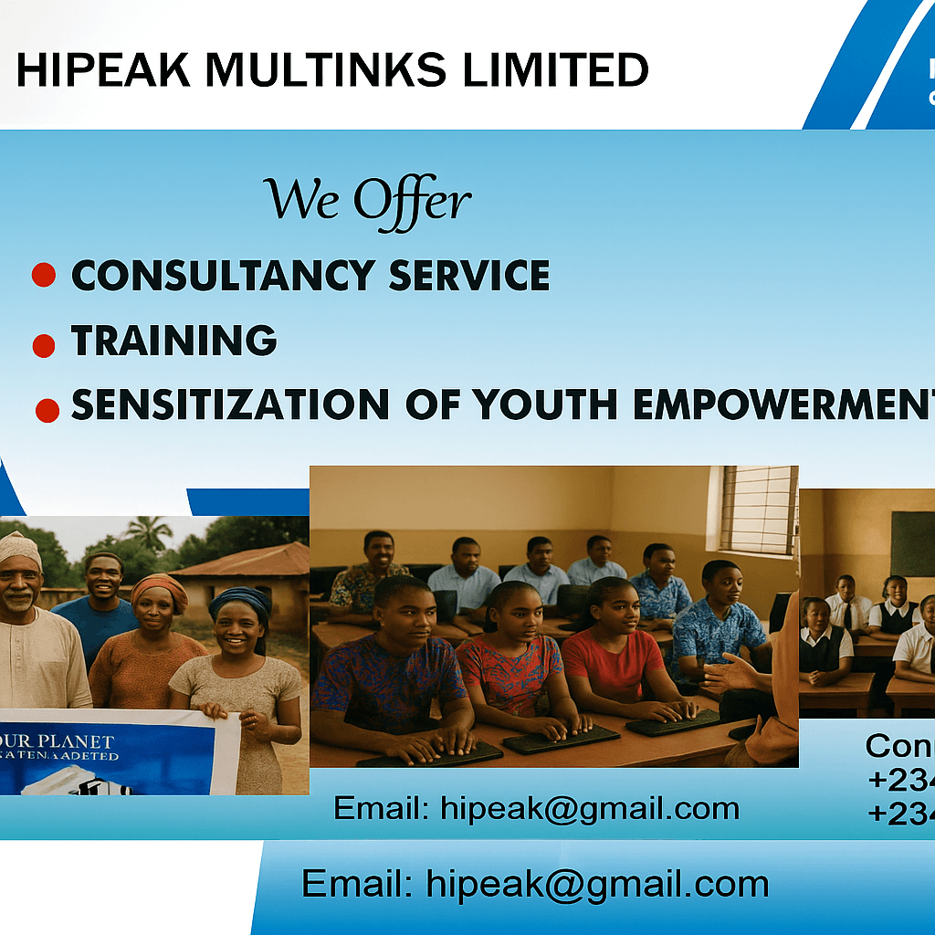 A group of diverse people working together in a workshop, looking engaged and collaborative.